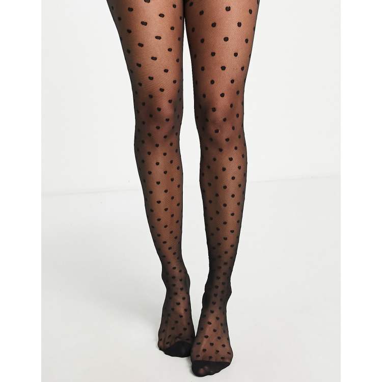 ASOS DESIGN medium polka dot tights in black