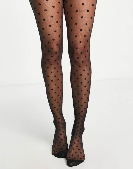 Women's black 20 tights with gold polka dot print