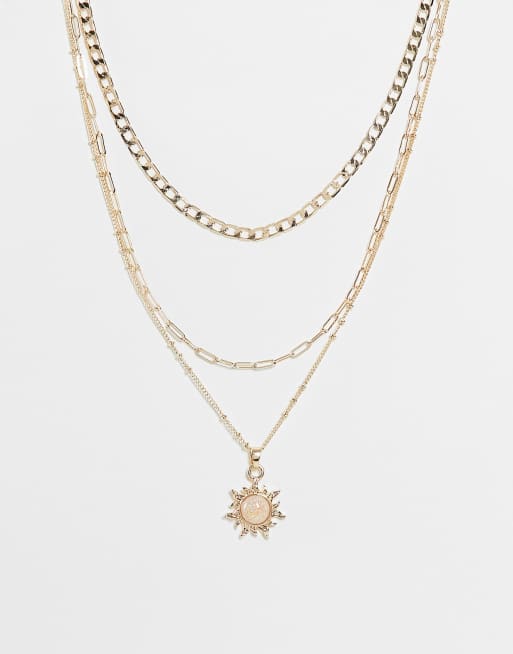 ASOS DESIGN - Meerlaagse ketting met opalen hanger met zonnestralen in goudkleur
