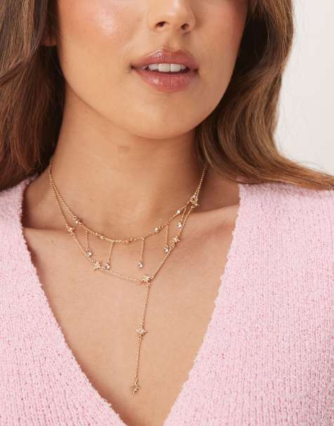 ASOS DESIGN – Mehrreihige, goldfarbene Lasso-Halskette mit Himmelskörper-Anhängern - view 1