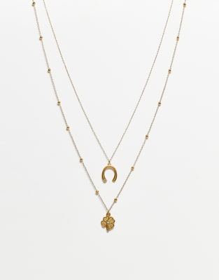 ASOS DESIGN - Mehrreihige Halskette aus wasserfestem Edelstahl in Goldoptik mit Hufeisenanhänger-Goldfarben