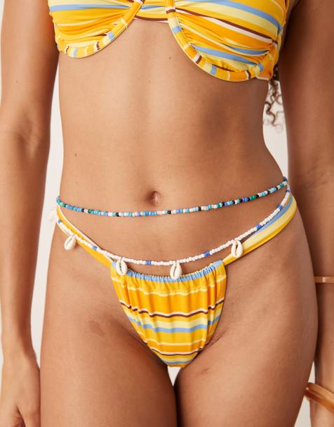 ASOS DESIGN – Mehrreihige Perlen-Bauchkette in Gold-Optik mit künstlichen Muscheln - view 1