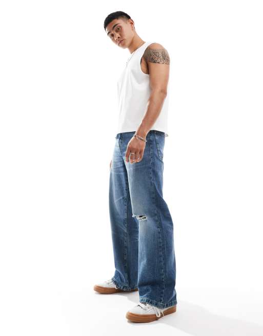 ASOS DESIGN – Mellanblå baggy jeans med bred fåll