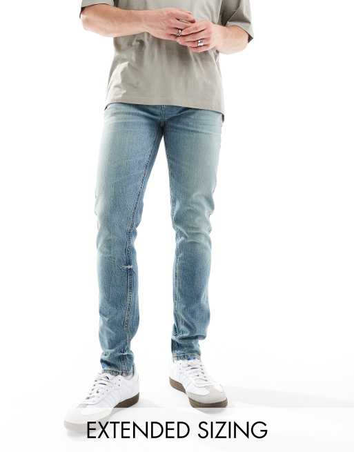 ASOS DESIGN – Mellanblå skinny jeans i vintagetvätt