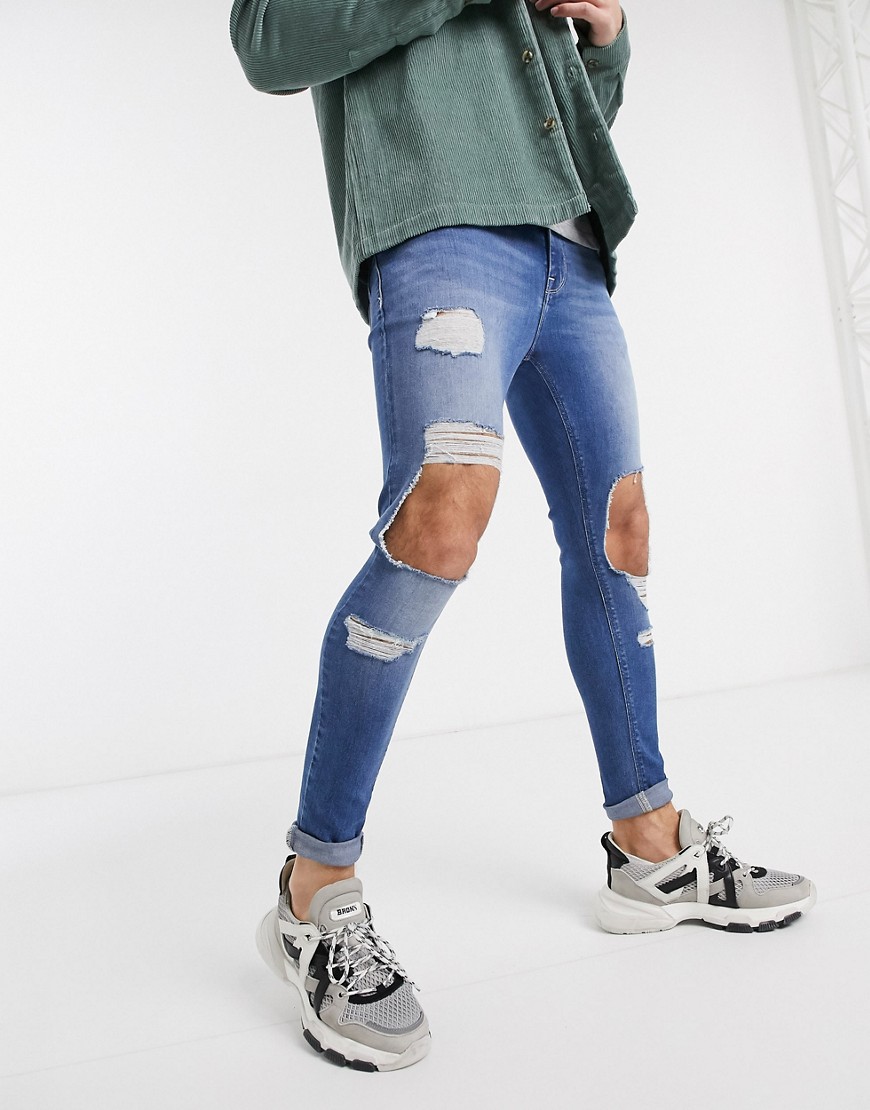 ASOS DESIGN – Mellanblå spray on-jeans i powerstretch med revor