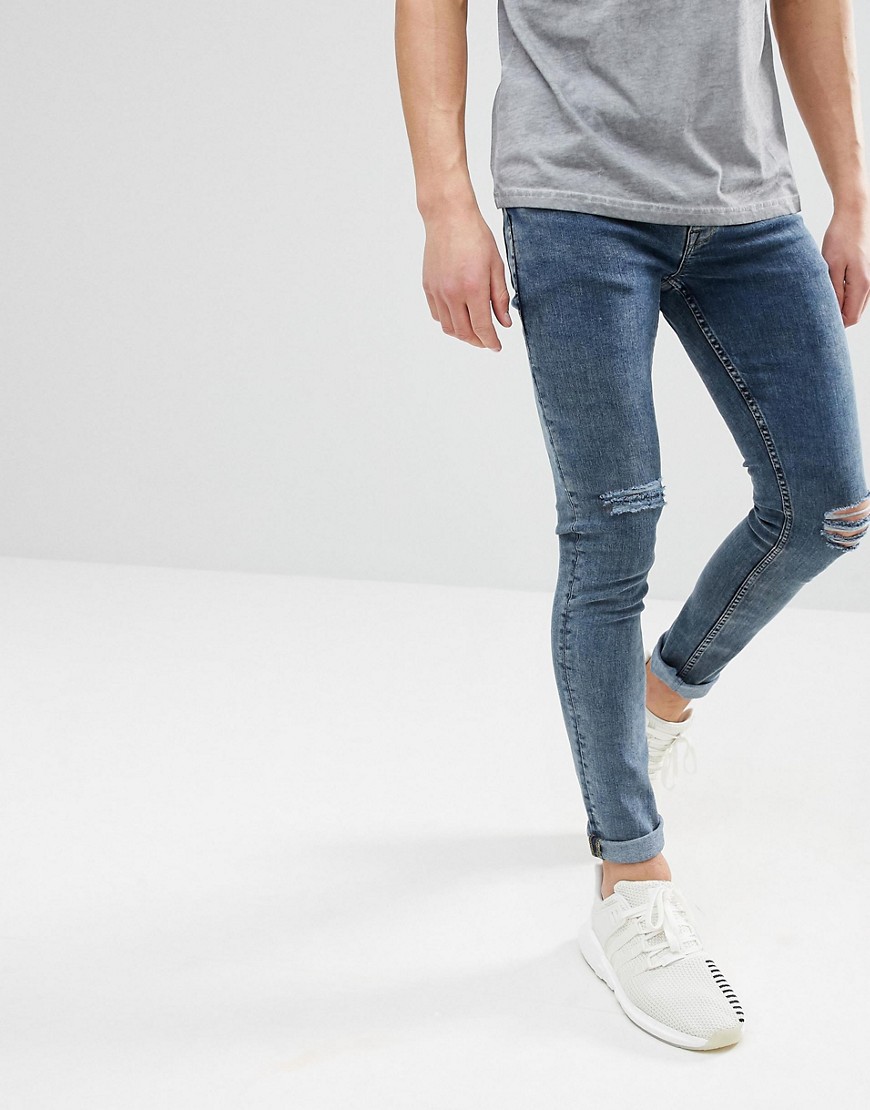ASOS DESIGN – Mellanblå superskinny jeans med slitna knän-Svart