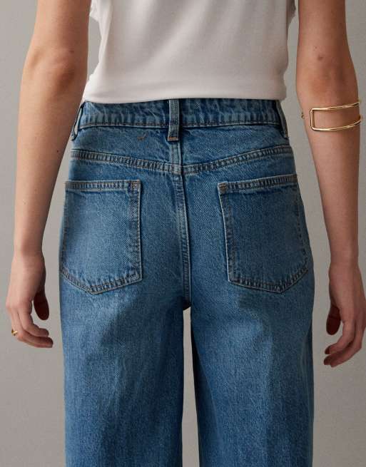 ASOS DESIGN – Mellanblå, tvättade jeans med hög midja, vida ben och framfickor, 4 av 7