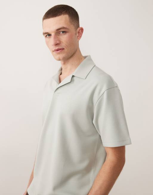 ASOS DESIGN – Mellangrön, kraftig pikétröja med avslappnad passform och tryck på bröstet, 4 av 5