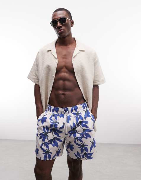 ASOS DESIGN - Mellemlange badeshorts med blomsterprint i blå - view 1