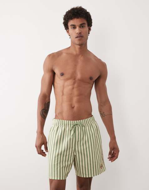 ASOS DESIGN - Mellemlange badeshorts med gule og grønne striber og broderet logomærke - view 1