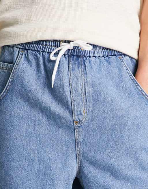 ASOS DESIGN - Mellemvaskede skinny denimshorts med almindelig længde og elastisk talje, 3 af 4