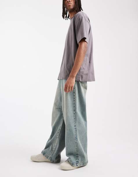 ASOS DESIGN - Mellemvasket blå superposede jeans med indsnit og tonet finish - view 1