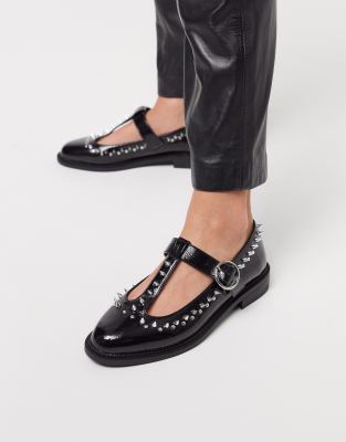 black studded flat shoes