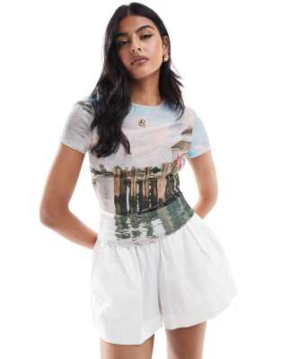 Shop ASOS DESIGN mesh baby tee with beach photographic Online – Trendy & Affordable Fashion