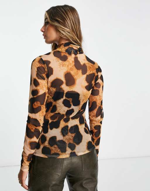 ASOS DESIGN plisse flare pants in animal print