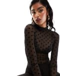 [ASOS DESIGN] ASOS DESIGN mesh long sleeve dobby polka dot flock bodysuit in black 4 Black