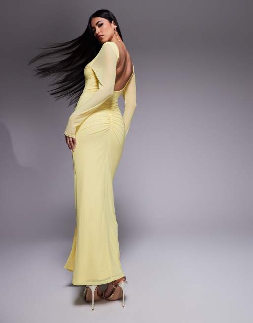 ASOS DESIGN mesh long sleeve slash neck open back maxi dress with sash in pastel yellow
