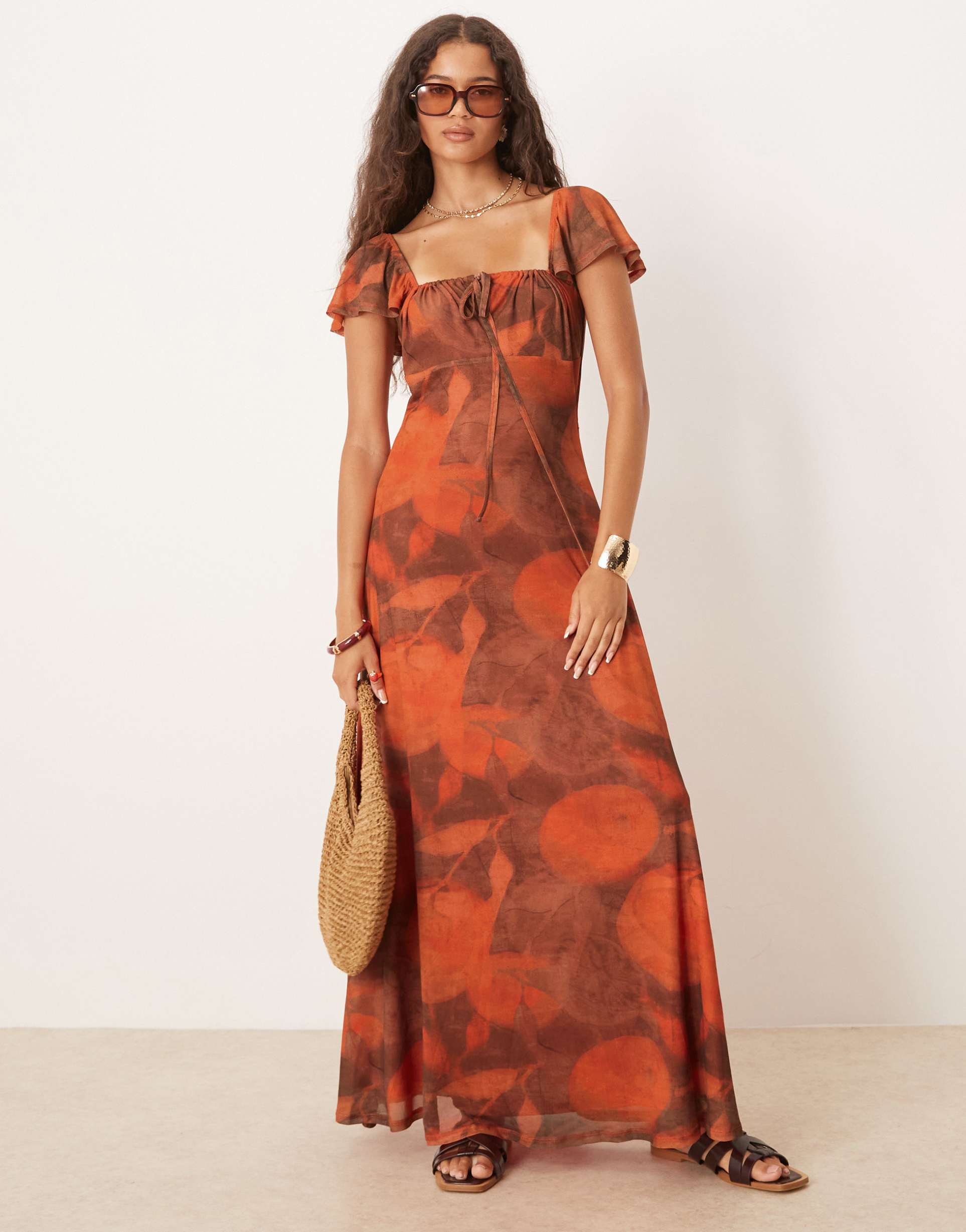 asos design mesh milkmaid open back maxi dress in orange print