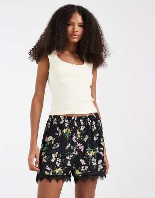 ASOS DESIGN mesh shorts with lace trim in floral print