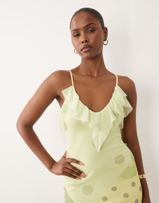 ASOS DESIGN mesh spliced polka dot plunge maxi dress with backless frill detail in lemon, 3 of 4