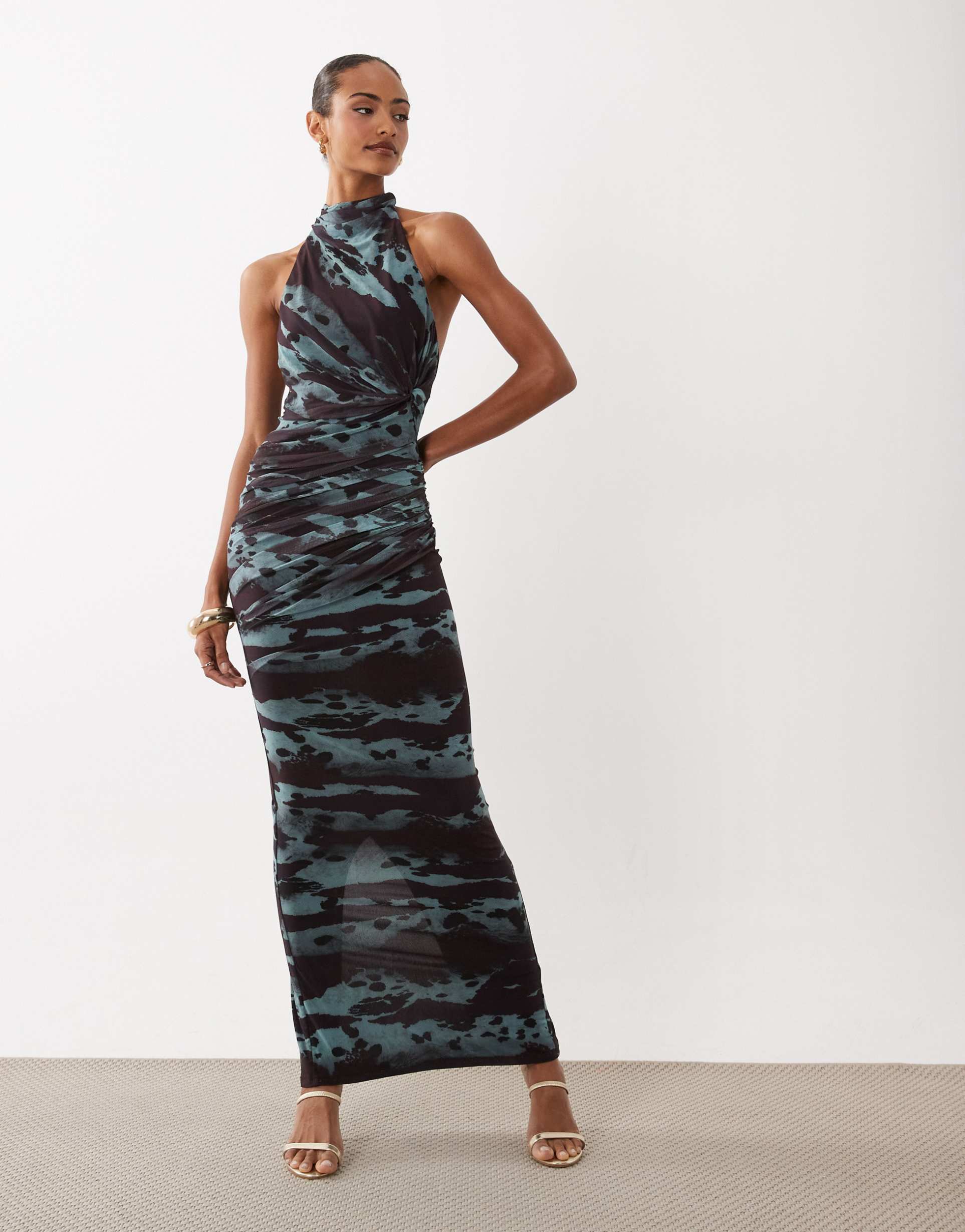asos design mesh twist bust detail halter maxi dress with tie back neck in abstract print