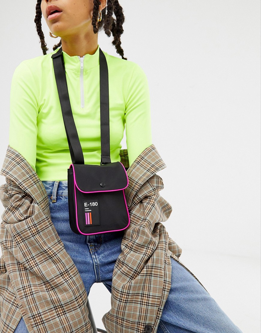ASOS DESIGN – Messengerbag med kantband i neon-Svart
