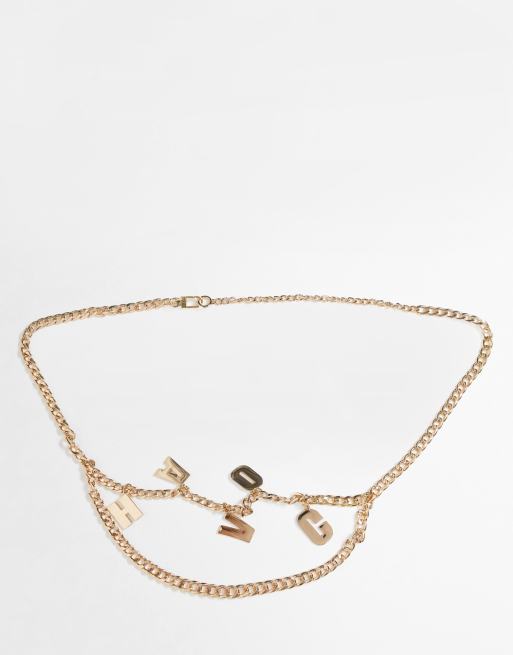 ASOS DESIGN metal chain belt with 'havoc' in gold | ASOS