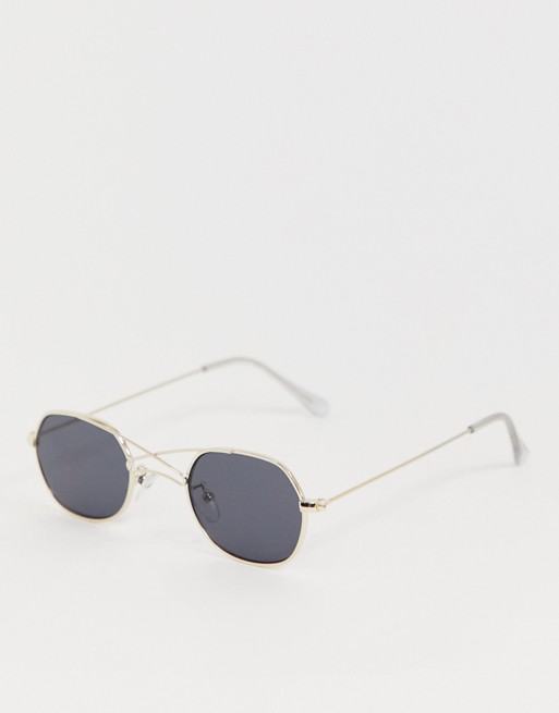 ASOS DESIGN 90s metal mini round sunglasses in gold with smoke lens and cross brow detail