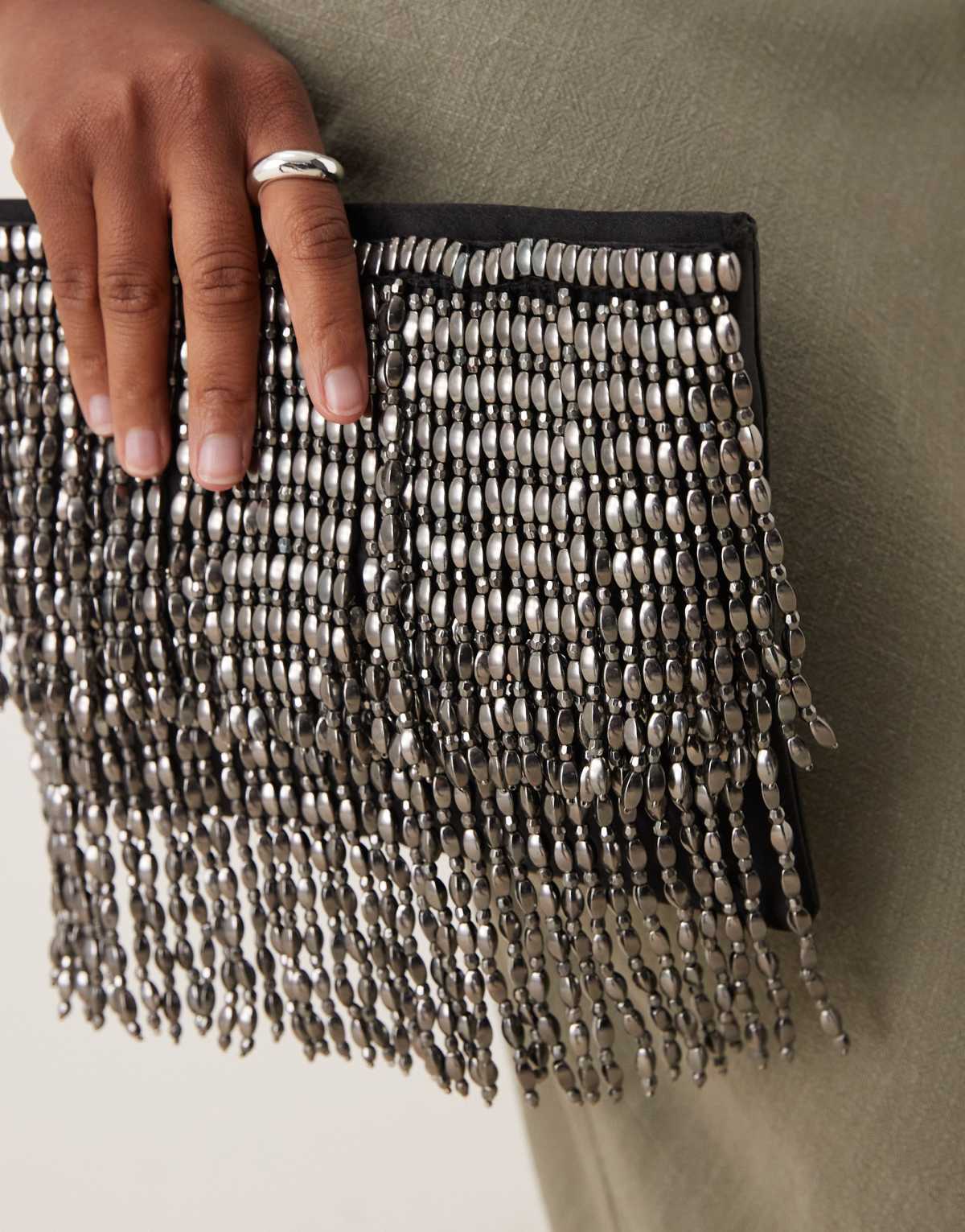 ASOS DESIGN metallic beaded fringe clutch bag in gunmetal