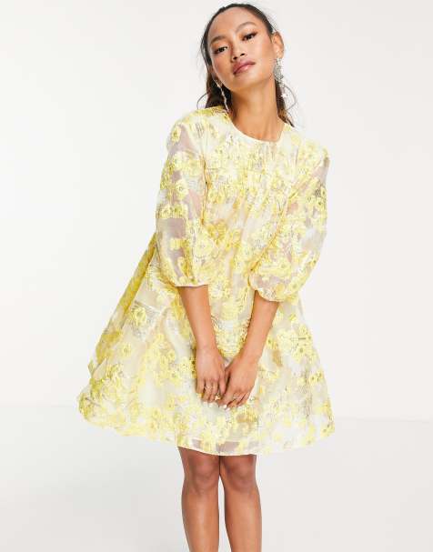 ASOS DESIGN metallic jacquard mini dress with puff sleeves in yellow - view 1
