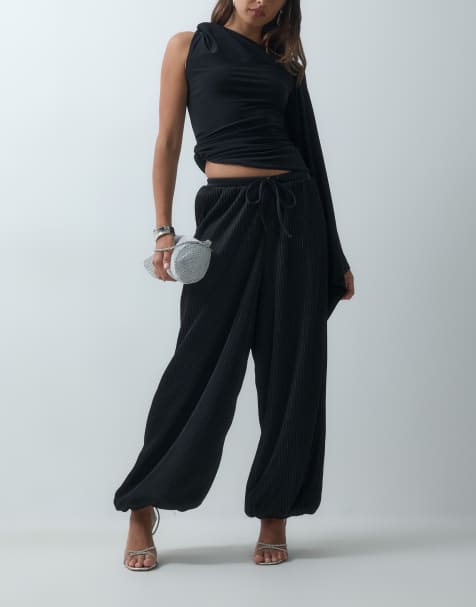 ASOS DESIGN metallic plisse balloon trousers in black - view 1
