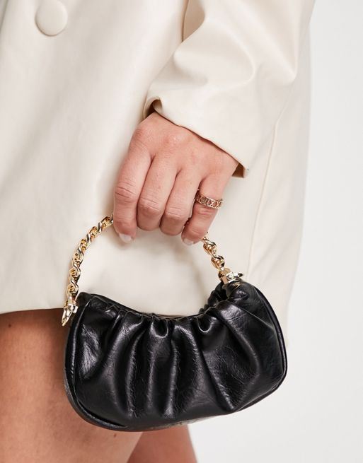 ASOS DESIGN faux feather clutch bag with gold handle in black
