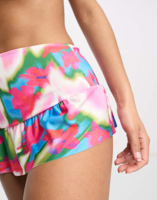 ASOS DESIGN micro swim skirt with frill hem in pink abstract