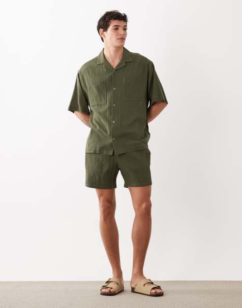 ASOS DESIGN mid length crinkle texture shorts in dark green (part of a set) - view 1