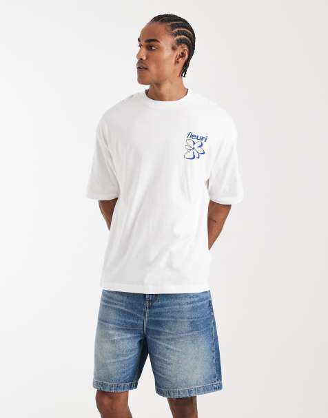 ASOS DESIGN mid length denim jorts in dark wash blue - view 1