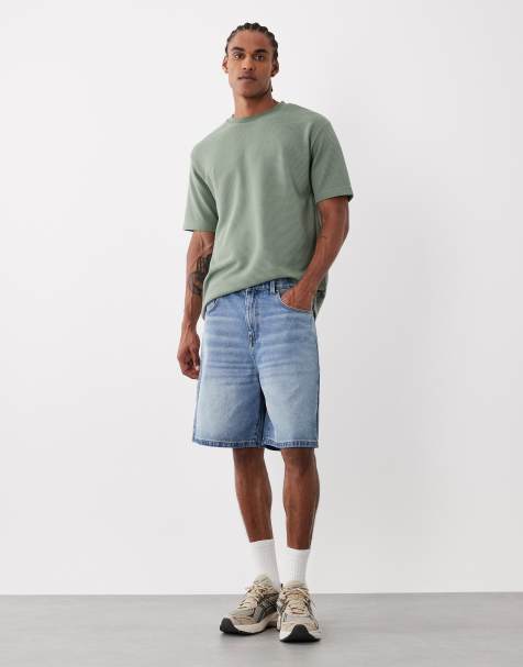 ASOS DESIGN mid length denim jorts in light washed blue - view 1