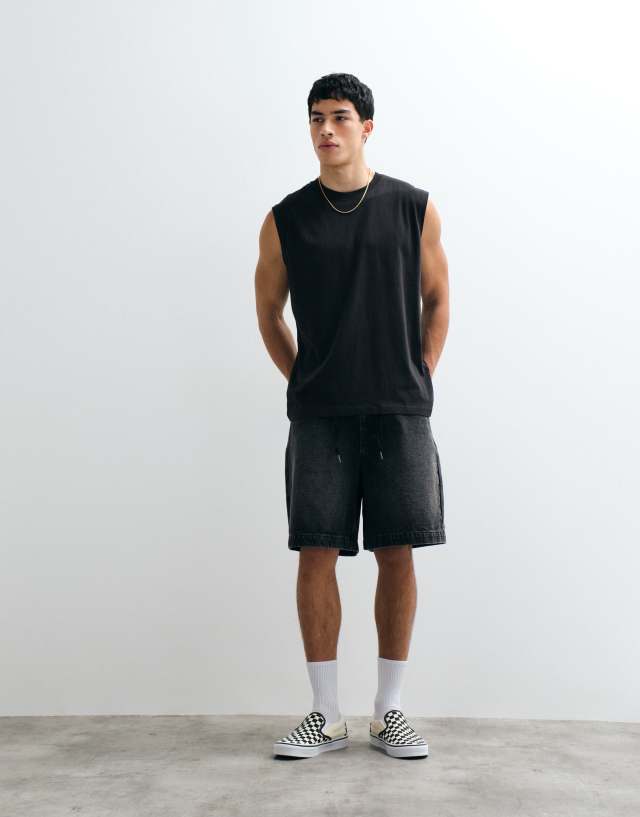 ASOS DESIGN mid length denim jorts in washed black with self tie