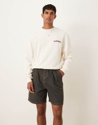 mid length denim jorts with double pleats in brown