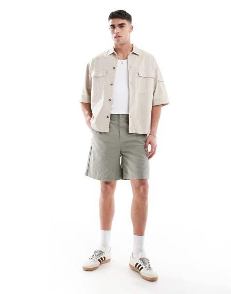 ASOS DESIGN mid length linen blend shorts in khaki green - view 1