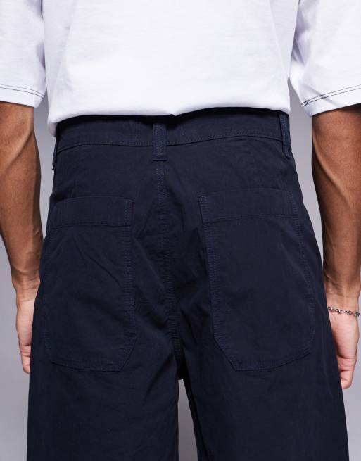 ASOS DESIGN mid length pleated shorts in navy