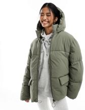 Vero Moda longline padded coat with oversized pockets in deep green