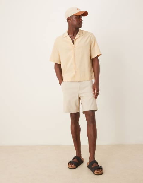 ASOS DESIGN mid length pull on chino short in stone - view 1