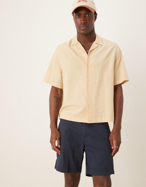ASOS DESIGN mid length pull on chino shorts in navy - view 1