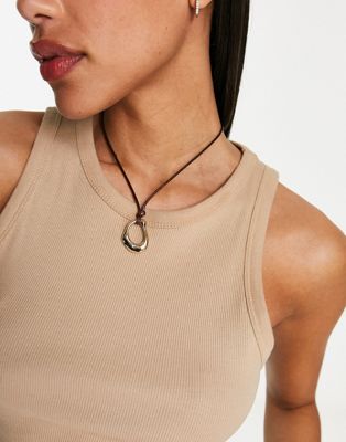 ASOS DESIGN mid length rope necklace with abstract pendant in gold tone | ASOS