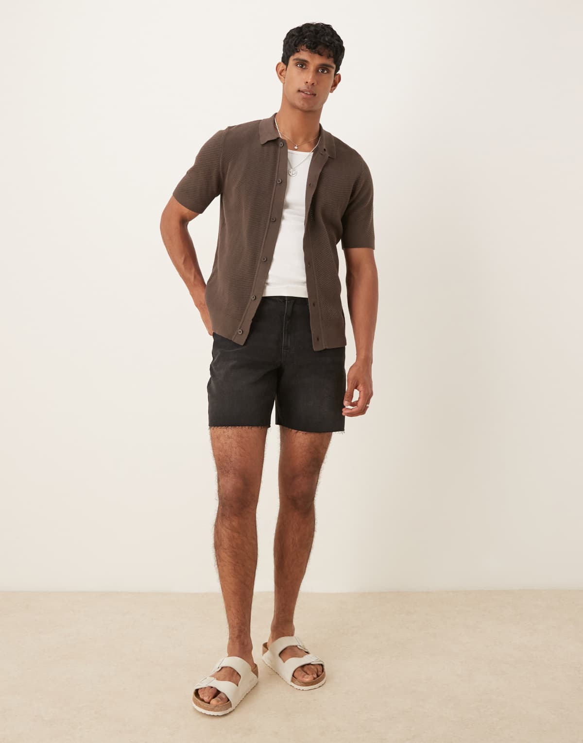 ASOS DESIGN mid length slim denim shorts in black