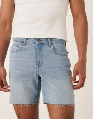 ASOS DESIGN mid length slim denim shorts in light wash blue
