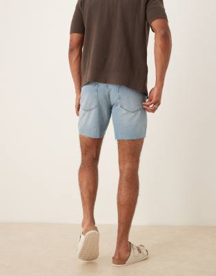 ASOS DESIGN mid length slim denim shorts in light wash blue