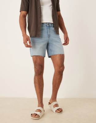 ASOS DESIGN mid length slim denim shorts in light wash blue