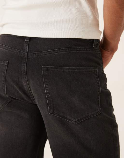 ASOS DESIGN mid length slim denim shorts with rips in black