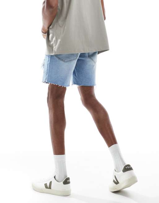 ASOS DESIGN mid length slim denim shorts with rips in light wash blue, 4 of 5